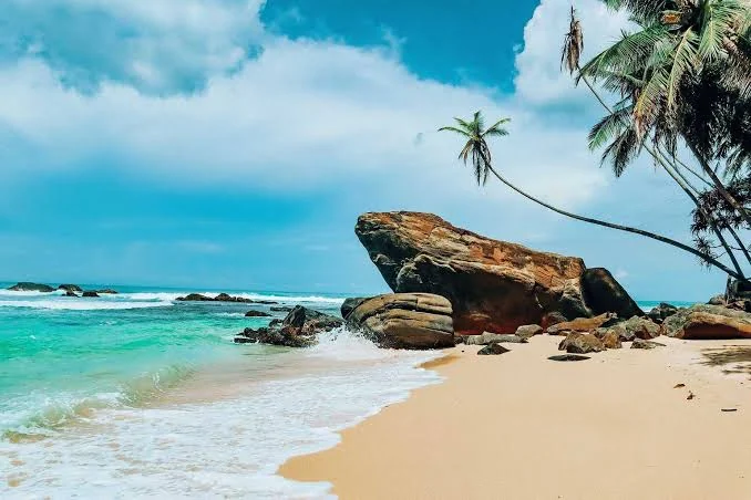 Tropical beach and rock on the Sri Lankan coast